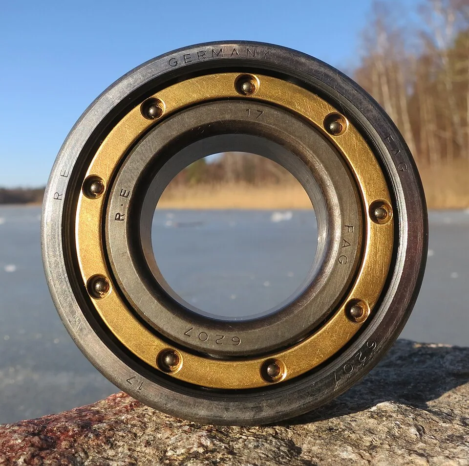 Close-up of a precision ball bearing with an engraved identification mark